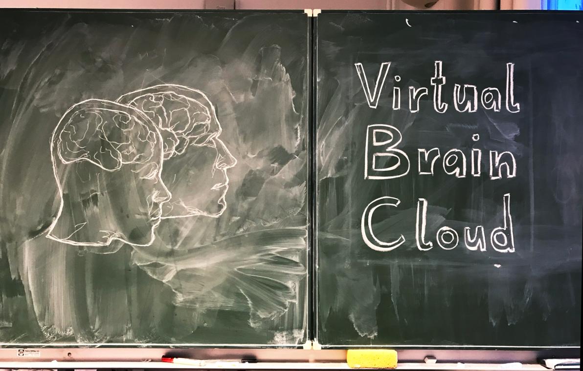 Drawing of VBC logo on a chalk board